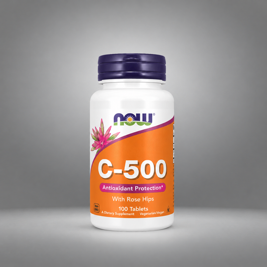 White bottle with purple cap, orange label reads "C-500 Antioxidant Protection" and shows rose hips.