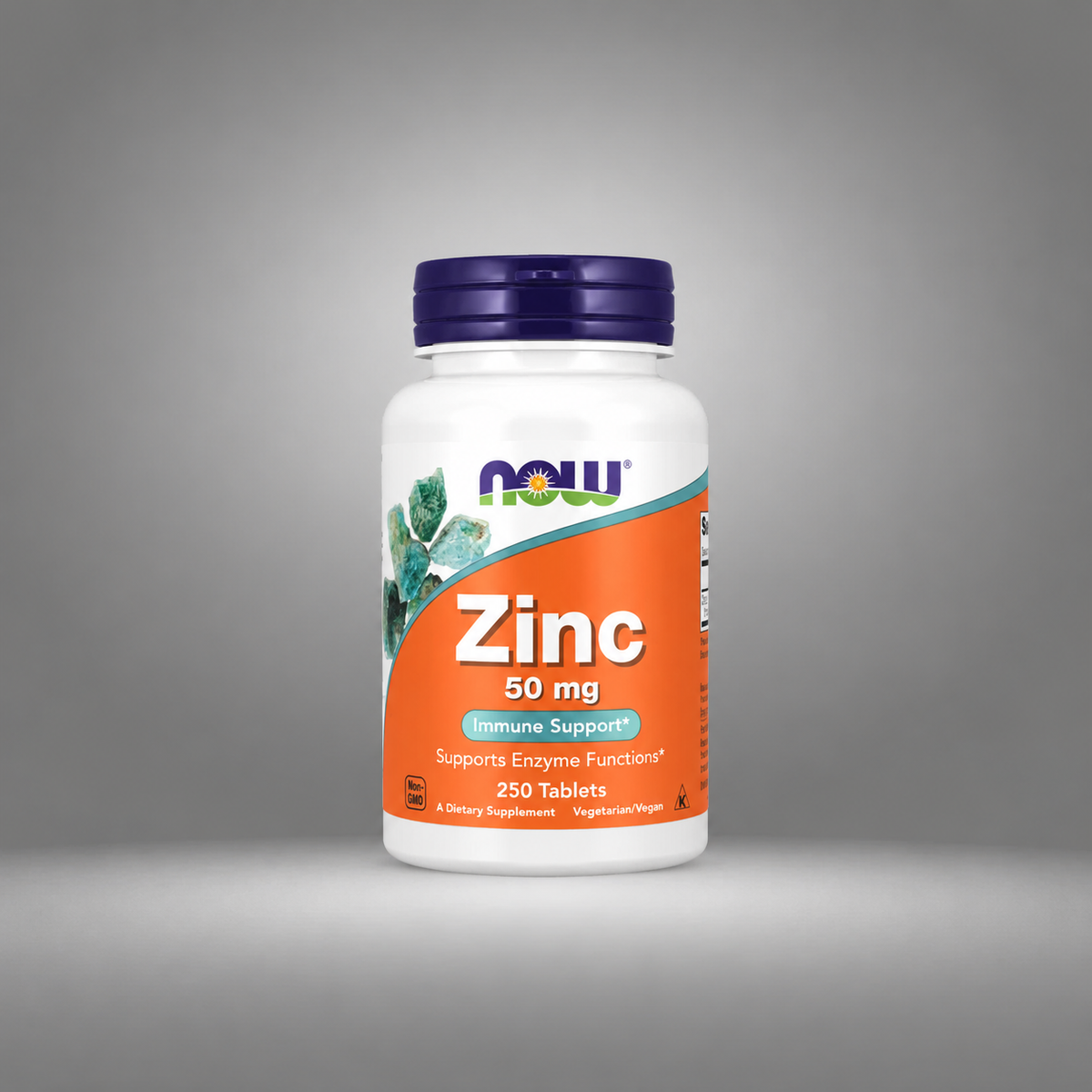 White bottle with purple cap, orange label reads "Zinc 50 mg, Immune Support."