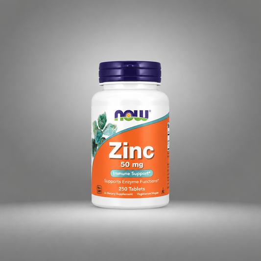 White bottle with purple cap, orange label reads "Zinc 50 mg, Immune Support."