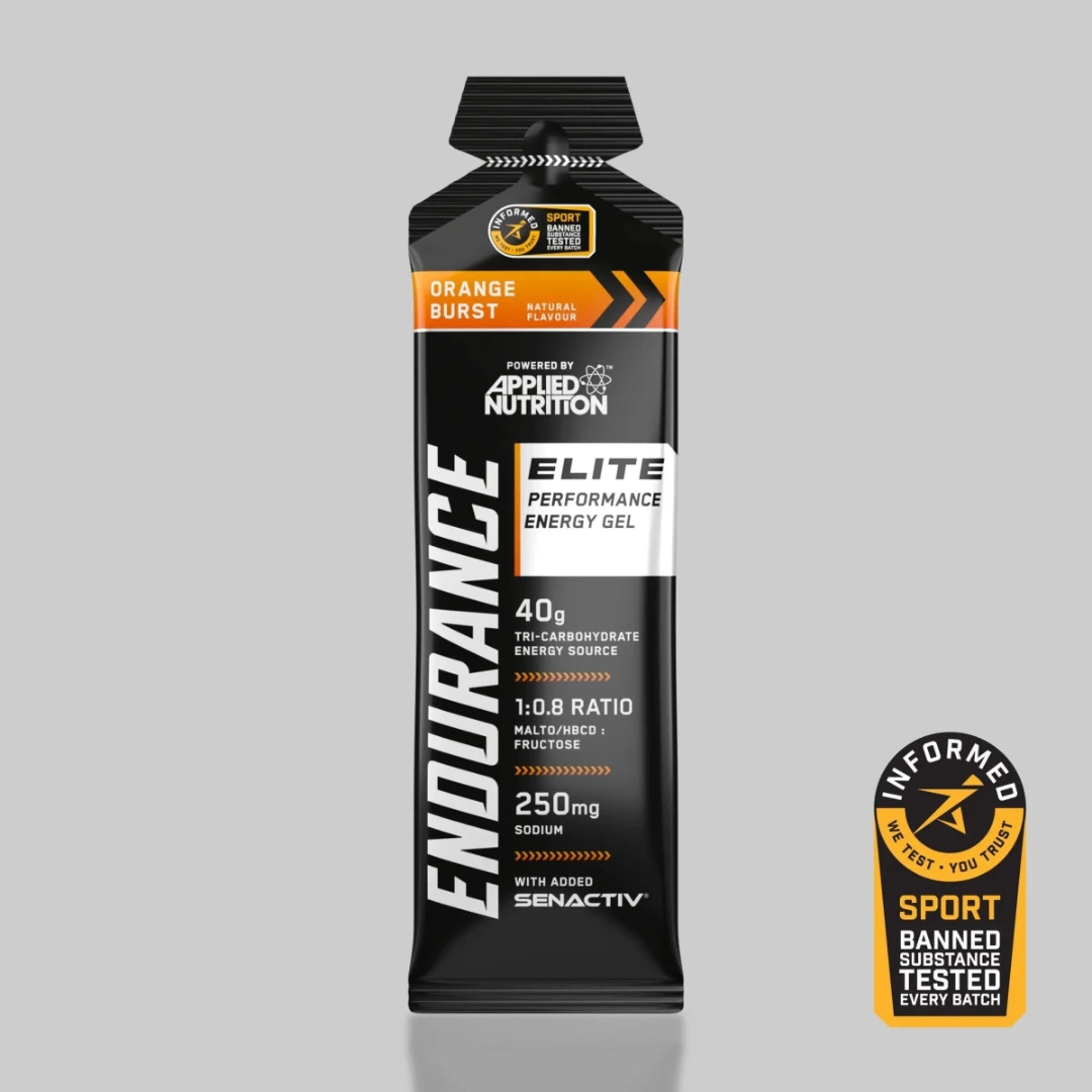 Black energy gel packet with white text, orange accents, and a certified sport badge on gray background.